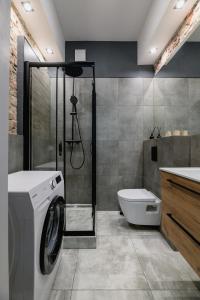 Kúpeľňa v ubytovaní oompH Warsaw Nowy Swiat Apartment