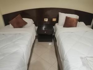 Postelja oz. postelje v sobi nastanitve Eiffel Hotel Hurghada