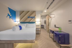Postel nebo postele na pokoji v ubytování COSI Krabi Ao Nang Beach - SHA Plus + 37 fotografií