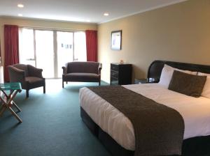 Postel nebo postele na pokoji v ubytování Cornwall Motor Lodge