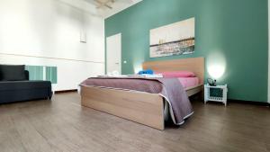 Posteľ alebo postele v izbe v ubytovaní Casa vacanza San Crispino, Boccetta.