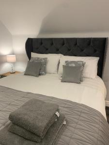 Ένα ή περισσότερα κρεβάτια σε δωμάτιο στο Minneymoor lodge