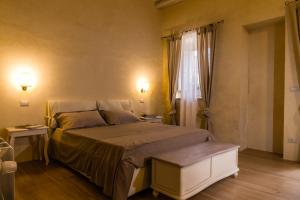 Letto o letti in una camera di Borgo del Carato