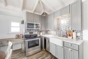 A cozinha ou cozinha compacta de Bama Breeze by Meyer Vacation Rentals