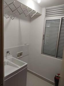 Koupelna v ubytování CONDOMINIO PEÑA AZUL LA MORADA