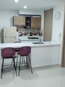 Kuchyň nebo kuchyňský kout v ubytování CONDOMINIO PEÑA AZUL LA MORADA