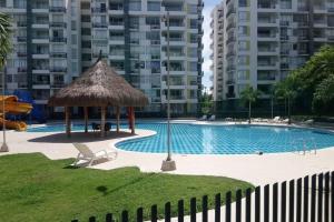 Bazén v ubytování CONDOMINIO PEÑA AZUL LA MORADA nebo v jeho okolí