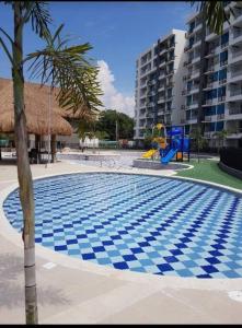 Bazén v ubytování CONDOMINIO PEÑA AZUL LA MORADA nebo v jeho okolí