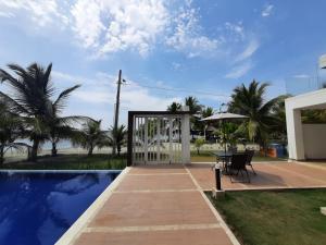 Bazén v ubytování Loft 39 Casa de playa nebo v jeho okolí