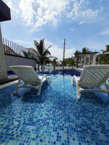 Bazén v ubytování Loft 39 Casa de playa nebo v jeho okolí