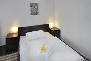 Postel nebo postele na pokoji v ubytování 1.Republic Hotel