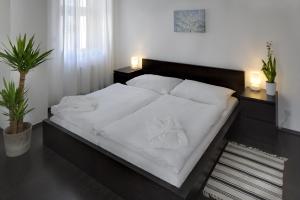 Postel nebo postele na pokoji v ubytování 1.Republic Hotel