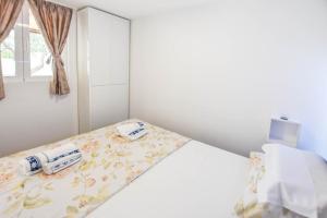 Łóżko lub łóżka w pokoju w obiekcie Mobile home Dandelion