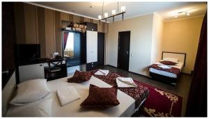 Katil atau katil-katil dalam bilik di IRIS Hotel
