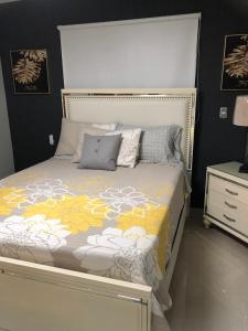 Кровать или кровати в номере Residencial PALMA REAL