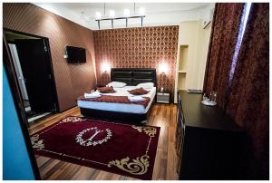 Katil atau katil-katil dalam bilik di IRIS Hotel