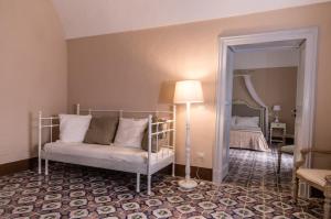 Letto o letti in una camera di Borgo del Carato