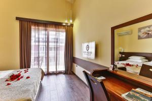 Katil atau katil-katil dalam bilik di Hotel Premier
