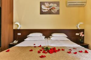 Katil atau katil-katil dalam bilik di Hotel Premier