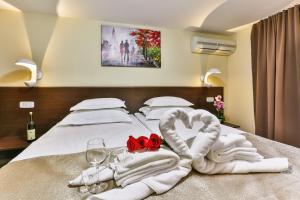 Katil atau katil-katil dalam bilik di Hotel Premier