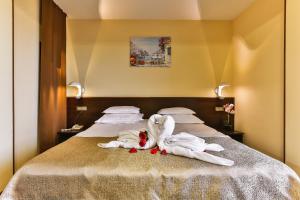 Katil atau katil-katil dalam bilik di Hotel Premier