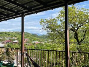 a view from the balcony of a house at Guest House Royal Comfort With Terrace in Kutaisi