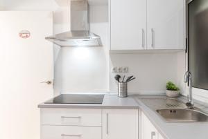A kitchen or kitchenette at AT TRAJANO 1