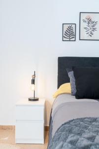 A bed or beds in a room at AT TRAJANO 1