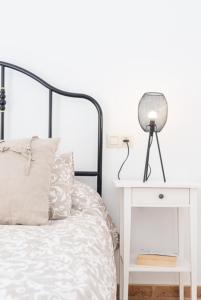 A bed or beds in a room at AT TRAJANO 1