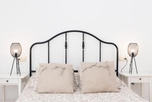 A bed or beds in a room at AT TRAJANO 1