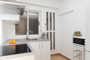 A kitchen or kitchenette at AT TRAJANO 1