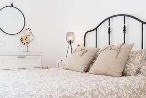 A bed or beds in a room at AT TRAJANO 1