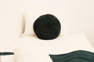 Posteľ alebo postele v izbe v ubytovaní Cosy & Perfect Located Apartment