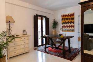 Posedenie v ubytovaní Apartamento Arkadio