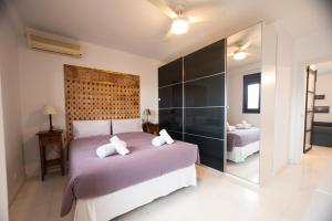 Posteľ alebo postele v izbe v ubytovaní Apartamento Arkadio