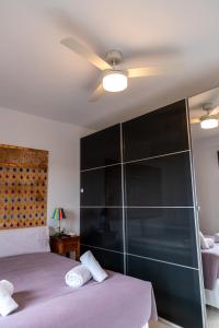 Posteľ alebo postele v izbe v ubytovaní Apartamento Arkadio