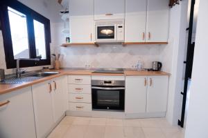 Kuchyňa alebo kuchynka v ubytovaní Apartamento Arkadio