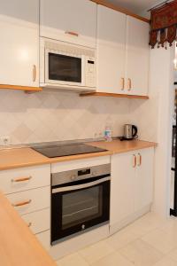 Kuchyňa alebo kuchynka v ubytovaní Apartamento Arkadio