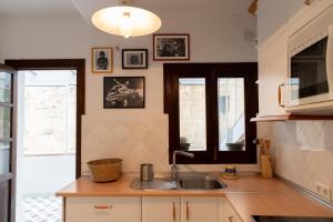 Kuchyňa alebo kuchynka v ubytovaní Apartamento Arkadio