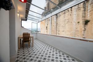 Posedenie v ubytovaní Apartamento Arkadio