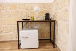 A kitchen or kitchenette at Apulian House