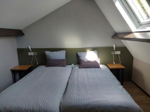 Postel nebo postele na pokoji v ubytování Boszicht 6 halfvrijstaande vakantiewoning in Oostkapelle