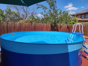 The swimming pool at or close to Friends & Family Apartmanok Velence