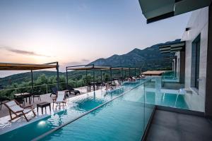 The swimming pool at or close to Serenity Suites Sea View Houses