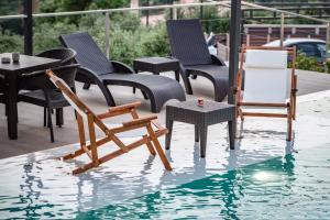 The swimming pool at or close to Serenity Suites Sea View Houses