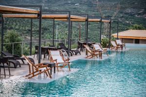 The swimming pool at or close to Serenity Suites Sea View Houses
