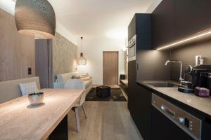 A kitchen or kitchenette at Gran Tubla