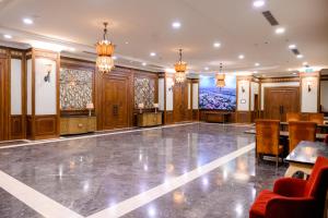 TV a/nebo společenská místnost v ubytování TTC Imperial Hotel