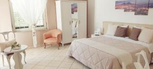 Postel nebo postele na pokoji v ubytování B&B Maison Blanche