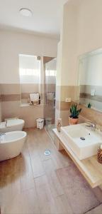 Koupelna v ubytování B&B Maison Blanche